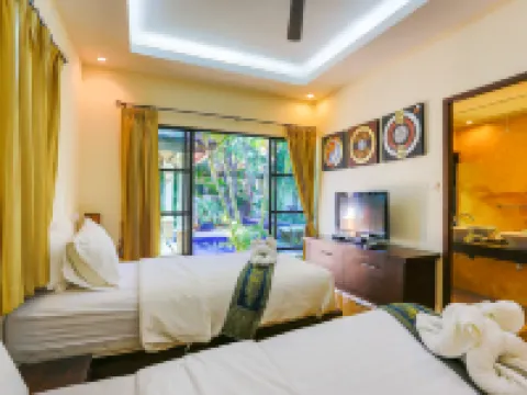 パ プライ ヴィラズ & スイーツ プラーンブリーのホテル