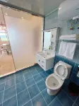 Yuguo Business Hotel - parkir