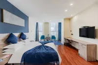 โรงแรมสไตล์บูทีคอี้เหอชุน (สถานีรถไฟความเร็วสูงอี้เหอใต้ โซนพัฒนาเทคโนโลยีขั้นสูง)