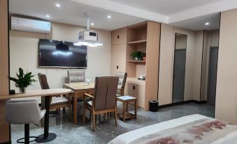 Mangkang Rumei Yijiang Kaiyue Hotel