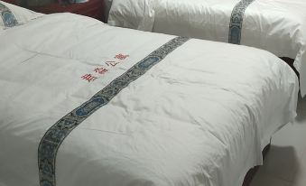 Xinzheng Junxu Apartment (Longhu Shengda University Branch)