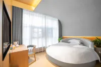 Shenghe Jiayuan Hotel (Three Halls and One Courtyard) Các khách sạn ở Yingbin Avenue/Jiangying Airport Business District