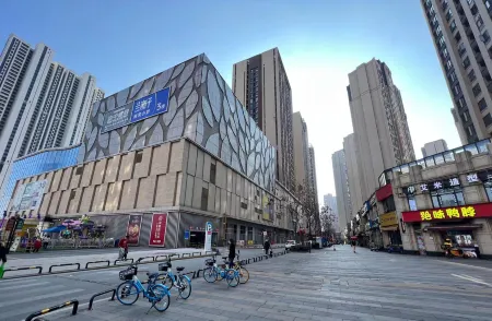 Manshi Time Art Hotel (Wuhan Happy Valley Renhe Road Subway Station) Отели рядом с достопримечательностью «Wuhan University of Science and Technology Qingshan Campus»