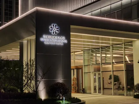 HUAHU INTERNATIONAL AIRPORT HOTEL Отели в г. Эчжоу