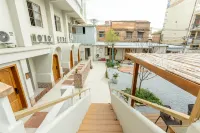 Luoyang Hemujia Art Homestay (Luoqi Ancient City Branch) Отели в г. Лоян