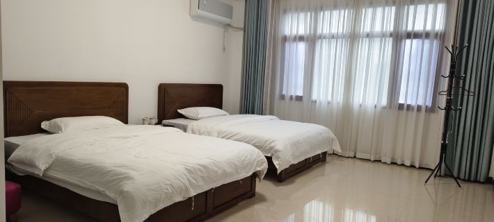 Xinyu Homestay Hotel di Kaijiang