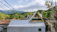 SANJIAN HOMESTAY & PARTY HALL Отели рядом с достопримечательностью «Пейзаж Лонгмен-Хунг»
