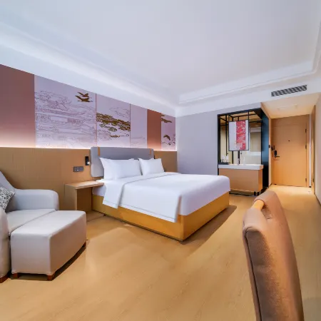 Merlinhod Hotel Отели рядом с достопримечательностью «Бассейн Черный Дракон»
