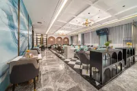 Yunfu Xinxing XANA Deluxe Hotel - พร้อมอาหารเช้า