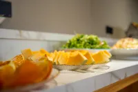 Huanpeng Holiday Hotel (Tianjin Haihe East Road Wanda Center Branch) - فطور
