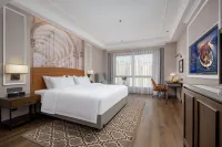 Vienna International Hotel (Cannei Government Wanda Plaza Store）) Отели рядом с достопримечательностью «Бруэй, Китай»