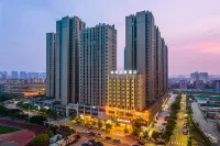 尚府軽宿ホテル（茂名高速鉄道駅東信時代広場） 茂名バスターミナル - 西区周辺のホテル