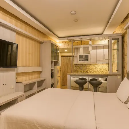 Quintessa Room at Candiland Apartement