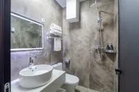 Orange Cinema Hotel (Taiyuan South Station East Square Wusu International Airport Store)