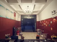 Ruxin Business Hotel (Chengwu Shengshi International Building Materials City)