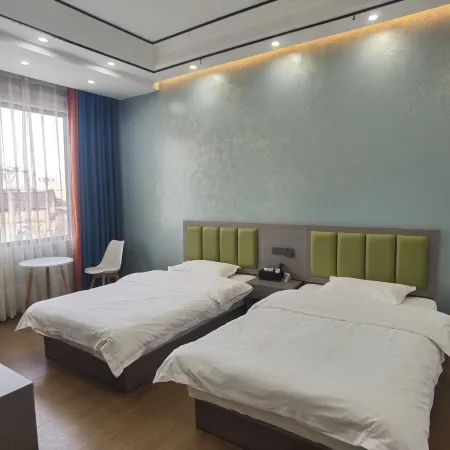 Heqing County Beiya Xingfu Hotel