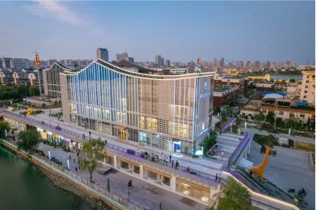 Liaocheng Log House Homestay (Dongchang Lake Branch) Отели рядом с достопримечательностью «Liaocheng Gymnasium»