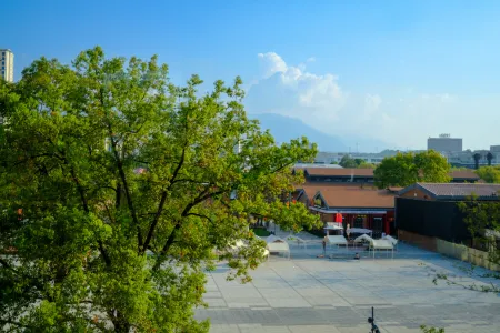 Chenfeng Designer Hotel (Jiujiang Shili Street Nanshan Garden) Отели рядом с достопримечательностью «Shimen Mountain Stream»