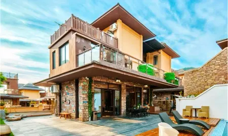 Dayi Huashuiwan Xiangxueling Villa Отели рядом с достопримечательностью «Huashuiwan First Village Hot Spring Hotel»