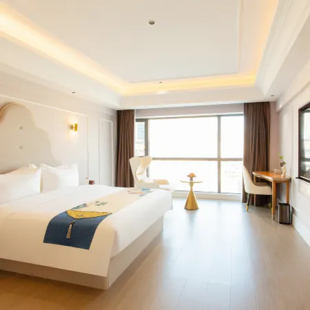 Wen Meihao EZZI Hotel (Huanghe Road Xin Pang Faxiang Shopping Center)