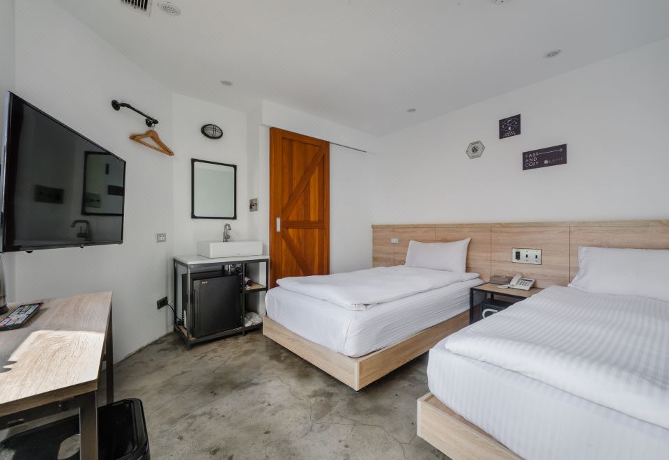 A clean and comfortable hotel room.