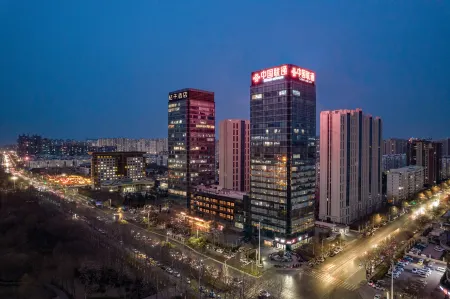 Orange Hotel (Wanda Plaza Branch of Anyang Municipal Government) Отели в г. Аньян