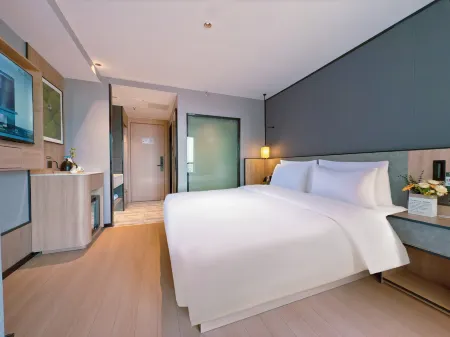 Pinrui Hotel (Jinan Luokou Garment City Zoo Branch) Отели рядом с достопримечательностью «Jinan Zoo»