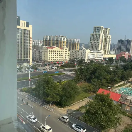 Weihai Jiaqi Hotel (Weihai high speed railway bus terminal store)
