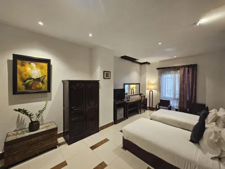 Family Boutique Hotel Отели рядом с достопримечательностью «Statue of Fa Ngum»