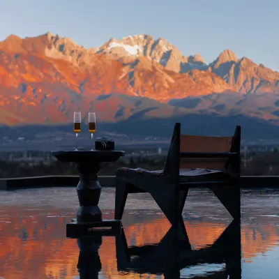 Shangheli · Golden Light Over Snowy Peaks Wild Luxury Mountain Resort Hotels near Lijiang Snow Mountain Falcon Valley Scenic Area