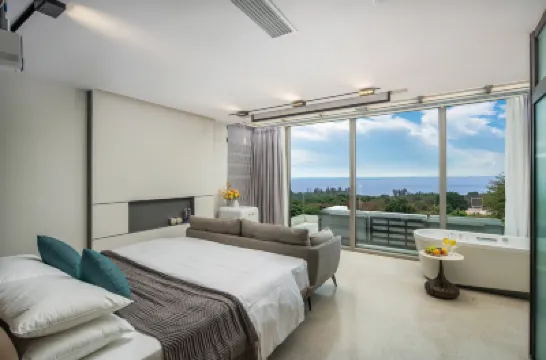 Yi'an jiujianhai Homestay (Weizhou Island Colorful Beach Branch) Hotel berhampiran Wucai Beach