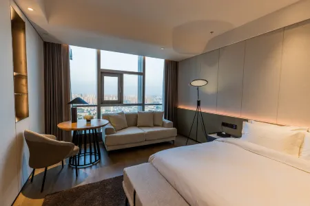 Fengyu Hotel (Wuxi Sanyang Square South Changjie Branch) Отели рядом с достопримечательностью «HeZhenLiang Yu AoLinPiKe ChenLieGuan»