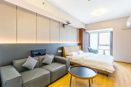 Guanhailu V+ Apartment (Yantai University Branch) Отели рядом с достопримечательностью «Wenjing College Yantai University»