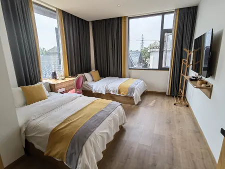 Lujiang Ruyouyuan Homestay Отели рядом с достопримечательностью «Xilai Ancient Town»