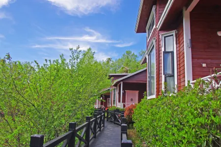 Jiuluzhai Scenic Area Wooden Villa Отели в г. Баокан