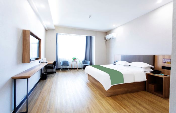 Shell Hotel (Fei County Dongfang Shopping Plaza Ginkgo Jin Street)