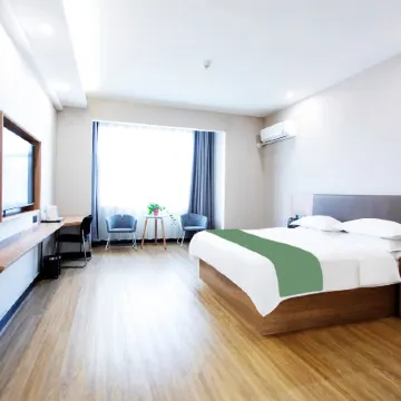 Shell Hotel (Fei County Dongfang Shopping Plaza Ginkgo Jin Street)