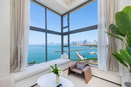 Meet Yunyue Seaview Art LOFT Vacation Apartment (Qingdao Evergrande Golden Beach Store) Отели рядом с достопримечательностью «Tangdao Bay Coastal Park»