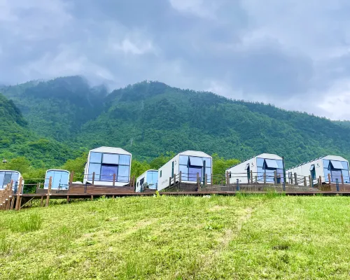 Deshell Turtle Camp Hotel (Daqi Xiling Snow Mountain Branch) Zimmer Photos