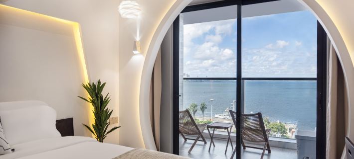 Baijue Designer Light Residence (Zhanjiang Jinsha Bay Beach, Zhaoshang Garden City Branch) Hotele w: Zhanjiang