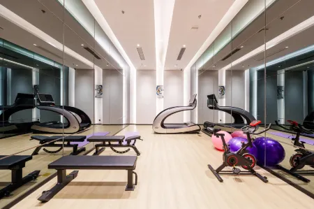 ROSSO HOTEL MUDU Отели рядом с достопримечательностью «Suzhouhuashanziran Sceneic Area»