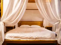 Xiaocha Ranch Camping Homestay 황위안 호텔