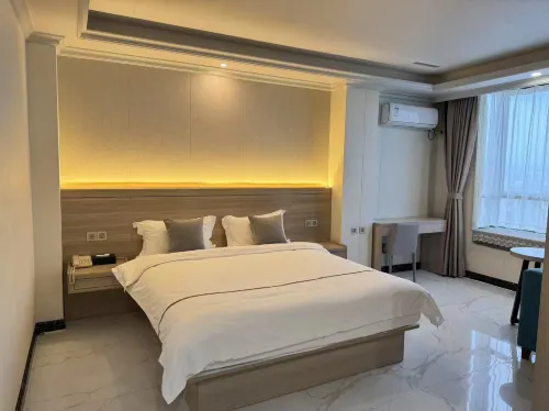Long An Xin Yi Business Hotel conversion