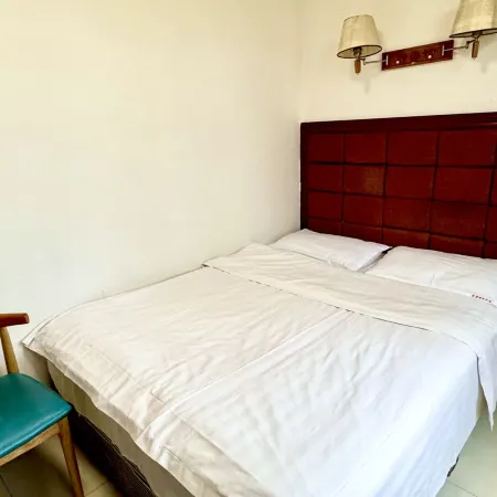 Wusheng Hexin Business Hotel
