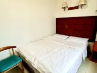 Wusheng Hexin Business Hotel - parkir