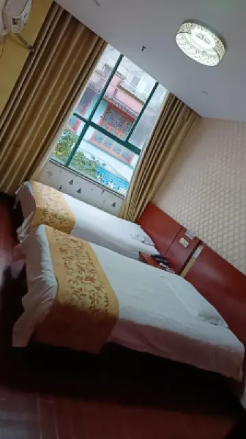 Wanzai Xincheng Business Hotel