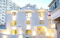 Design Guesthouse (Harbin Central Avenue Hongzhuan Street Morning Market)