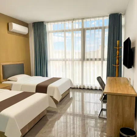 Xincheng Hotel (Yiwei Branch)