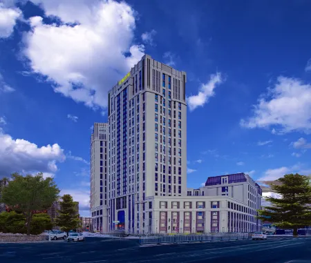 Gulun Hotel (Harbin Wanda Plaza West Station) Отели рядом с достопримечательностью «Heilongjiang University»
