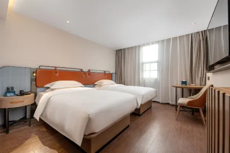 โรงแรมอีชาร์ม (สถานีรถไฟกว่างโจวใต้ สถานีรถไฟใต้ดินจางหลงจงชุน)